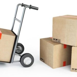A hand truck loaded with moving boxes, representing the Tacoma moving company and their moving & storage services.
